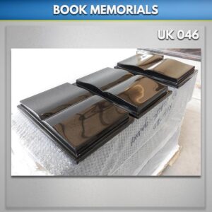 Open book headstones for graves