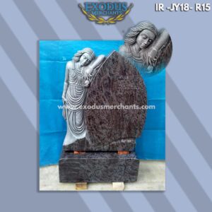 Angel with Rose Carved bahama blue Ireland grave