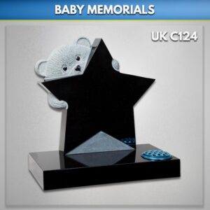 child-headstone-with-star-doll-carving