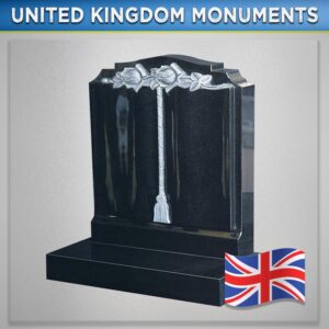 Carved Roses Antiqued on a black Book Headstone